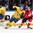 MOSCOW, RUSSIA - MAY 15: Switzerland's Eric Blum #58 grabs hold of Sweden's Jimmie Ericsson #21 during preliminary round action at the 2016 IIHF Ice Hockey World Championship. (Photo by Andre Ringuette/HHOF-IIHF Images)

